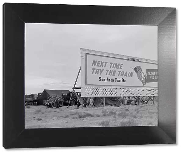 Three families camped on the plains along US 99 in California, 1938. Creator: Dorothea Lange