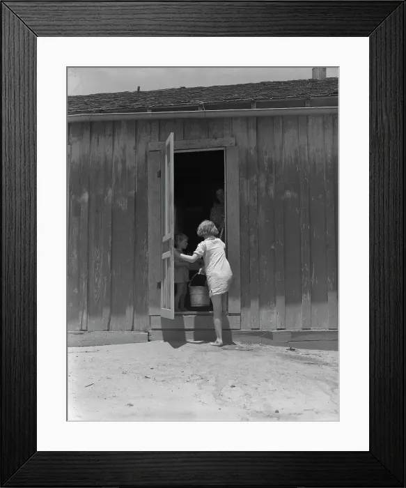 Framed Print : Child of Texas sharecropper carrying water, 1937. Creator: Dorothea Lange Framed Print : Child of Texas sharecropper carrying water, 1937. Creator: Dorothea Lange