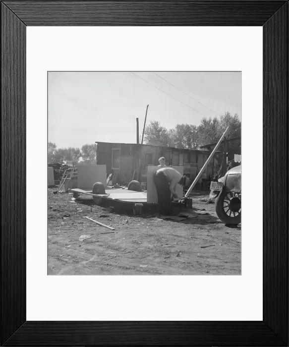 Framed Print : Building an auto trailer in a squatter camp, Outskirts of Bakersfield, California, 1936. Creator: Dorothea Lange Framed Print : Building an auto trailer in a squatter camp, Outskirts of Bakersfield, California, 1936. Creator: Dorothea Lange