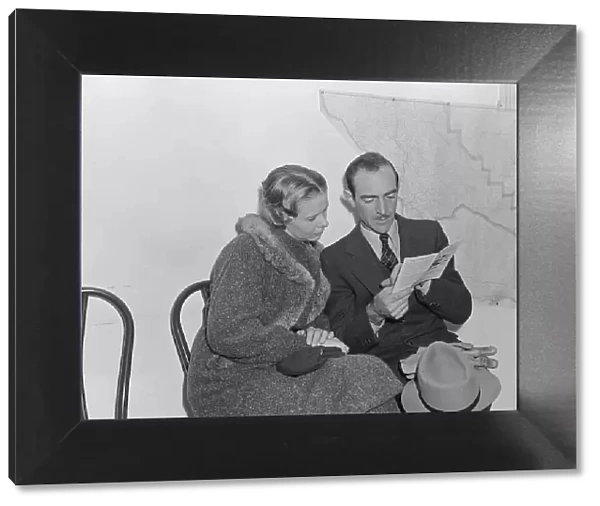Night meeting in the FSA office, Visalia, Tulare County, California, 1938. Creator: Dorothea Lange