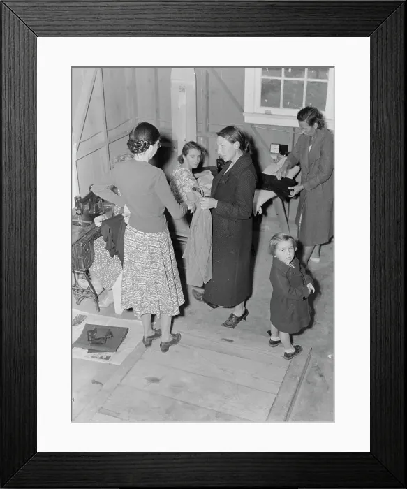 Framed Print : Camper receives help in fitting a coat from WPA sewing instructor, FSA, California, 1938. Creator: Dorothea Lange Framed Print : Camper receives help in fitting a coat from WPA sewing instructor, FSA, California, 1938. Creator: Dorothea Lange