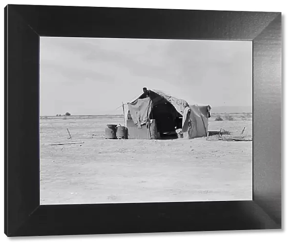 Tent housing a family, Imperial County, California, 1937. Creator: Dorothea Lange