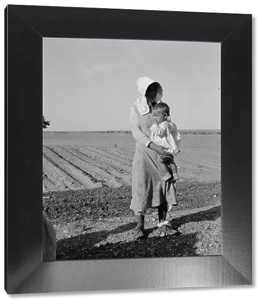 Mother and child of flood refugee family, near Memphis, Texas, 1937. Creator: Dorothea Lange
