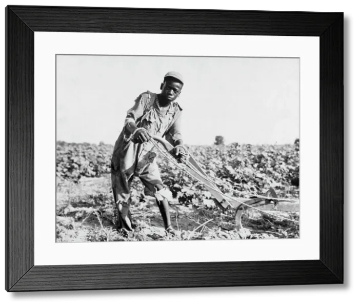 Framed Print : Thirteen-year old sharecropper boy near Americus, Georgia, 1937. Creator: Dorothea Lange Framed Print : Thirteen-year old sharecropper boy near Americus, Georgia, 1937. Creator: Dorothea Lange