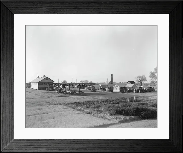 Framed Print : View of Kern migrant camp showing outdoor clubroom with protection from the sun, California, 1936. Creator: Dorothea Lange