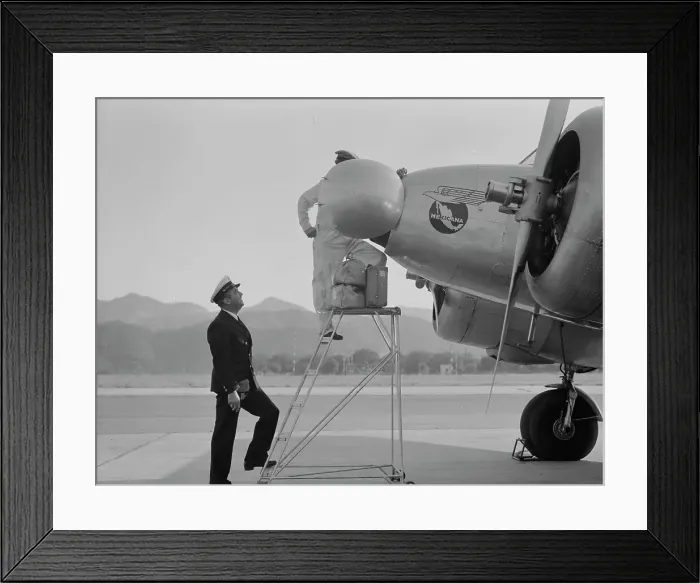 Framed Print : Plant quarantine inspectors examining plane at the Glendale Airport, California, 1937. Creator: Dorothea Lange Framed Print : Plant quarantine inspectors examining plane at the Glendale Airport, California, 1937. Creator: Dorothea Lange