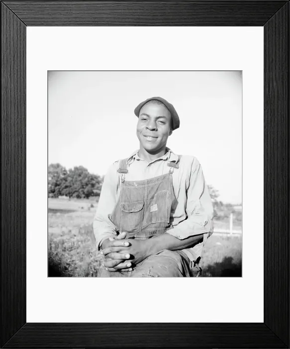 Framed Print : Plough boy sitting on fence after a day's work, Eutaw, Alabama, 1936. Creator: Dorothea Lange Framed Print : Plough boy sitting on fence after a day's work, Eutaw, Alabama, 1936. Creator: Dorothea Lange