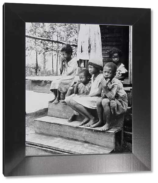 Children of turpentine worker near Cordele, Alabama, 1936. Creator: Dorothea Lange