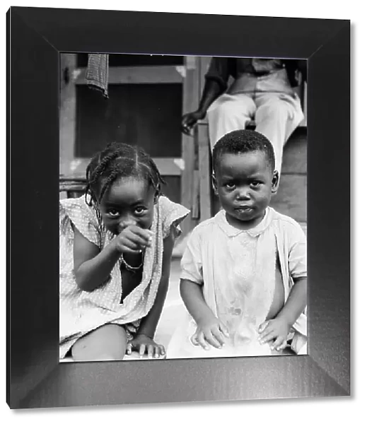 Children of evicted sharecropper, now living on Sherwood Eddy cooperative plantation, 1936. Creator: Dorothea Lange