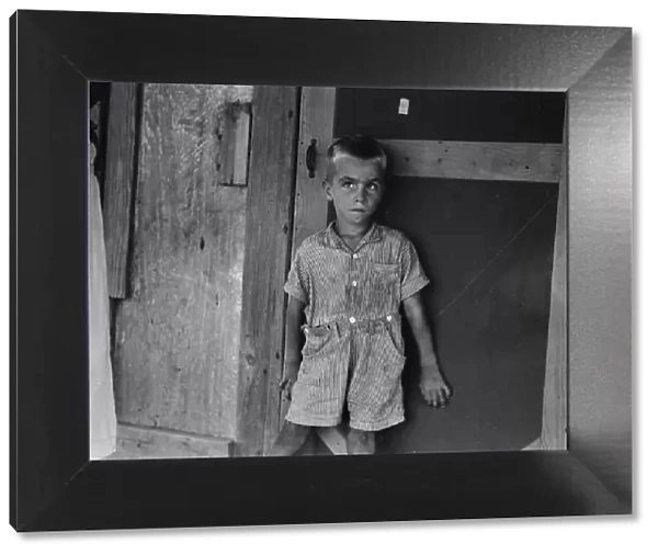 Child of sharecropper family near Cleveland, Mississippi, 1937. Creator: Dorothea Lange