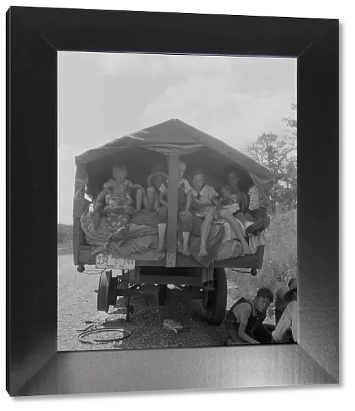 On highway no. 1 of the 'OK' state near Webbers Falls, Muskogee County, Oklahoma, 1938. Creator: Dorothea Lange. On highway no. 1 of the 'OK' state near Webbers Falls, Muskogee County, Oklahoma, 1938. Creator: Dorothea Lange
