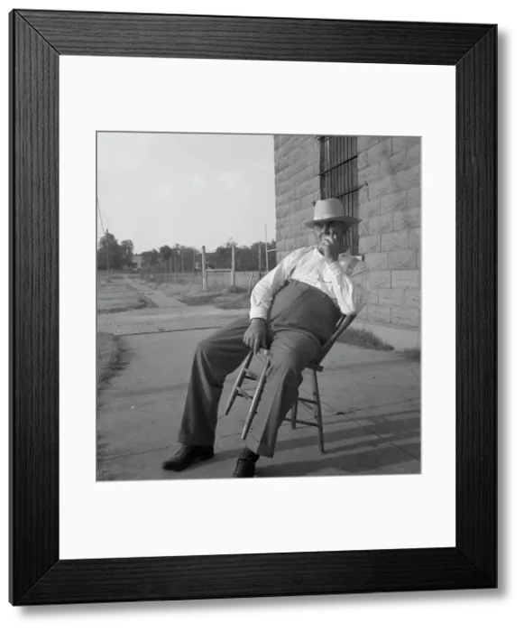 Framed Print : The sheriff of McAlester, Oklahoma, sitting in front of the jail, 1936. Creator: Dorothea Lange Framed Print : The sheriff of McAlester, Oklahoma, sitting in front of the jail, 1936. Creator: Dorothea Lange