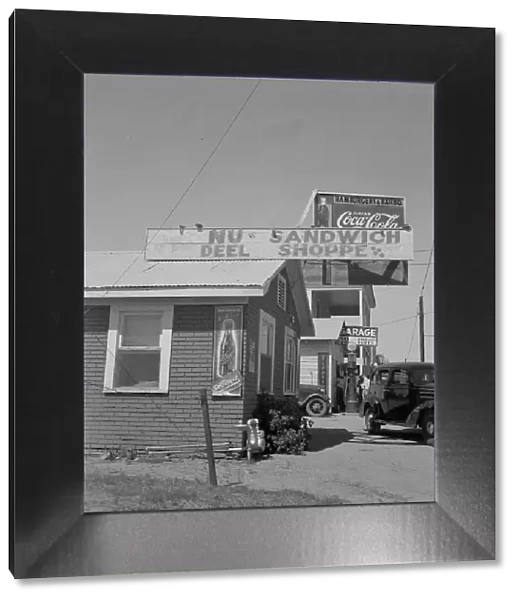 Roadside stand and filling station near Ennis, Texas, 1937. Creator: Dorothea Lange