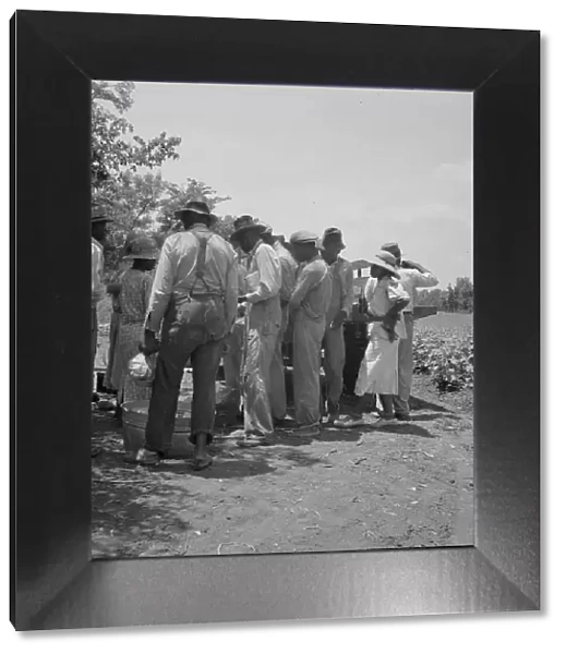 Lunchtime for cotton hoers, Mississippi Delta, 1937. Creator: Dorothea Lange
