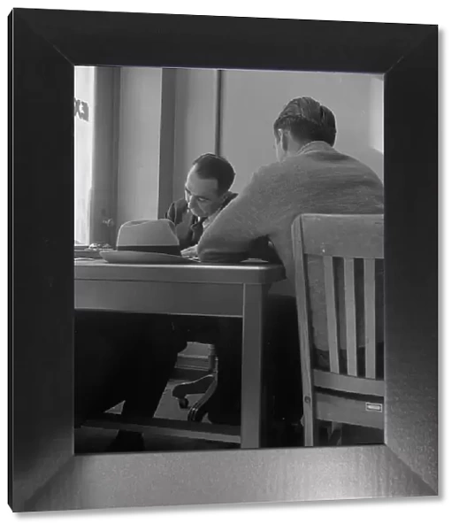 The interview for unemployment compensation, San Francisco, California, 1938. Creator: Dorothea Lange