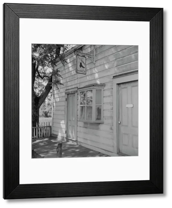 Framed Print : Boot and shoemaker shop in small California town, 1938. Creator: Dorothea Lange Framed Print : Boot and shoemaker shop in small California town, 1938. Creator: Dorothea Lange