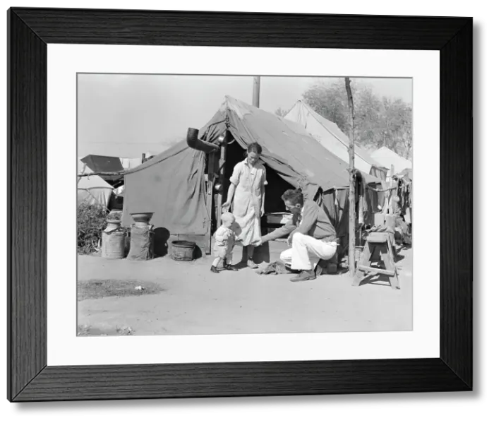 Framed Print : Tom Collins, manager of Kern migrant camp, with drought refugee family, California, 1936. Creator: Dorothea Lange Framed Print : Tom Collins, manager of Kern migrant camp, with drought refugee family, California, 1936. Creator: Dorothea Lange