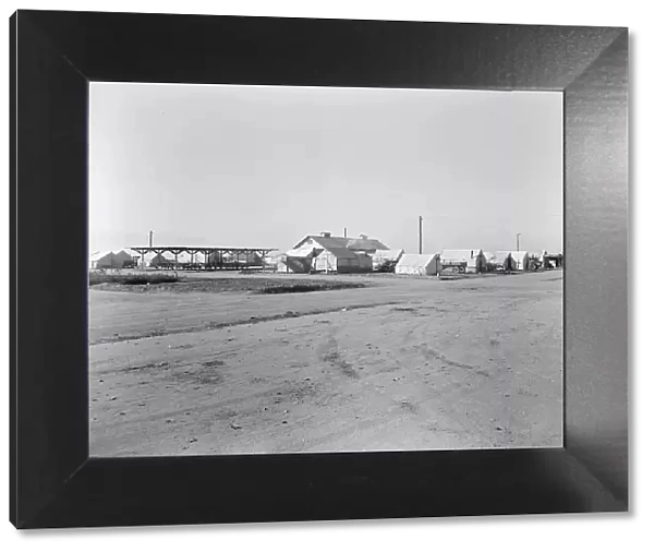 View of Kern migrant camp...sanitary units, CA, 1936. Creator: Dorothea Lange