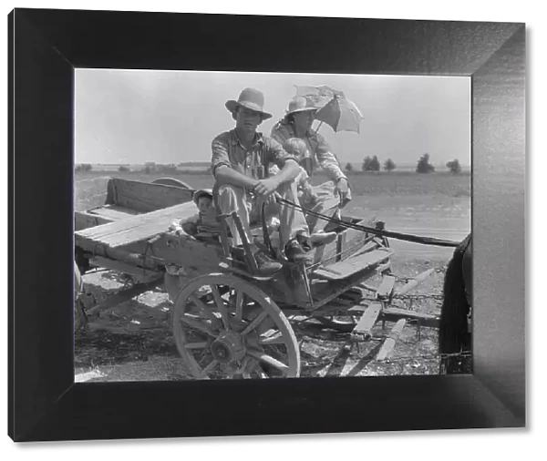 Drought-stricken farmer and family near Muskogee, Oklahoma, 1939. Creator: Dorothea Lange