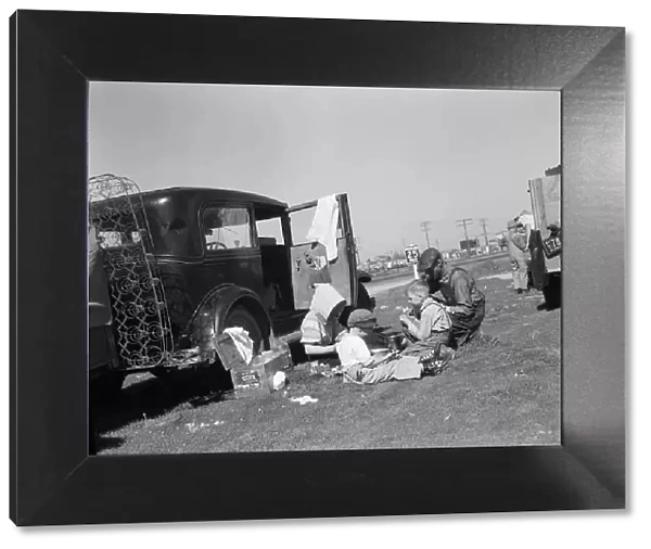 Oklahomans bound for Oregon along a highway in California, 1937. Creator: Dorothea Lange