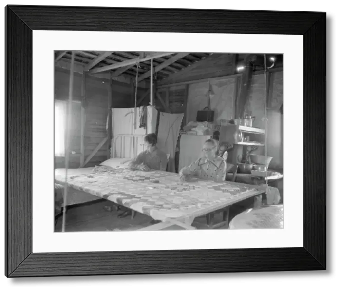 Framed Print : Grandmother from Oklahoma with grandson, working on quilt, California, Kern County, 1936. Creator: Dorothea Lange Framed Print : Grandmother from Oklahoma with grandson, working on quilt, California, Kern County, 1936. Creator: Dorothea Lange