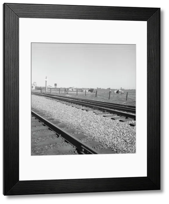 Framed Print : Migrants tents...along the right of way of the Southern Pacific, near Fresno, CA, 1939. Creator: Dorothea Lange Framed Print : Migrants tents...along the right of way of the Southern Pacific, near Fresno, CA, 1939. Creator: Dorothea Lange