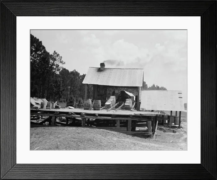 Framed Print : Turpentine still in the Piney Woods near Valdosta, Georgia, 1937. Creator: Dorothea Lange Framed Print : Turpentine still in the Piney Woods near Valdosta, Georgia, 1937. Creator: Dorothea Lange