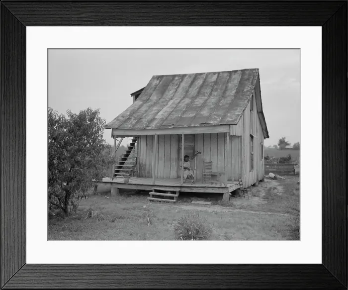 Framed Print : Cotton field hand sitting on her porch on Sunday afternoon, near Blytheville, Arkansas, 1937. Creator: Dorothea Lange Framed Print : Cotton field hand sitting on her porch on Sunday afternoon, near Blytheville, Arkansas, 1937. Creator: Dorothea Lange