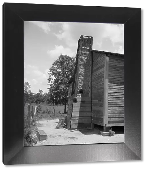 Home of family left stranded when the mill 'cut out' Near Kiln, Mississippi, 1937. Creator: Dorothea Lange. Home of family left stranded when the mill 'cut out' Near Kiln, Mississippi, 1937. Creator: Dorothea Lange