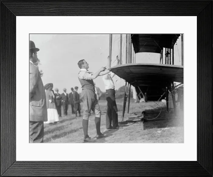 Framed Print : Claude Grahame-White - Fixing Wing of His Forman Plane, 1910. Creator: Harris & Ewing. Claude Grahame-White - Fixing Wing of His Forman Plane, 1910. Creator: Harris & Ewing