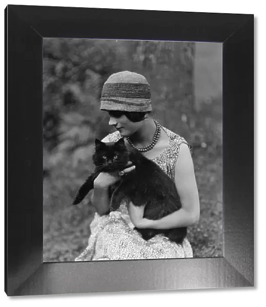 Elizabeth Duncan dancer, with cat, portrait photograph, 1926 Creator: Arnold Genthe