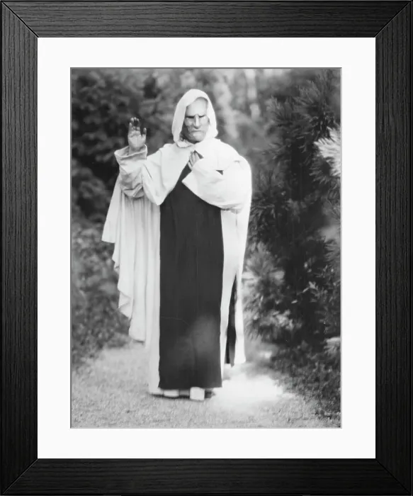 Framed Print : Person wearing a mask made by W.T. Benda, 1925 Sept. 20. Creator: Arnold Genthe