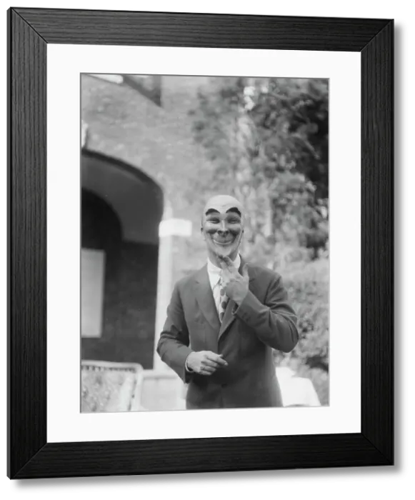 Framed Print : Person wearing a mask made by W.T. Benda, 1925 Sept. 20. Creator: Arnold Genthe Framed Print : Person wearing a mask made by W.T. Benda, 1925 Sept. 20. Creator: Arnold Genthe
