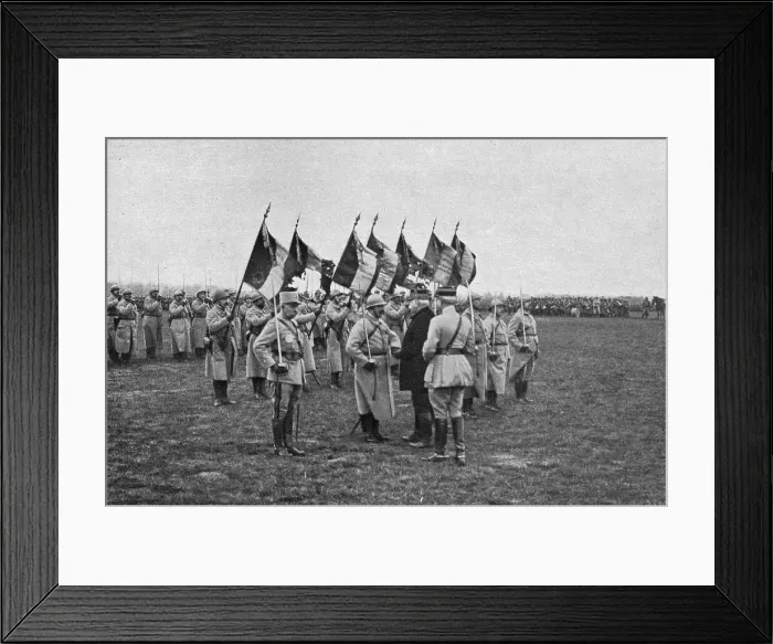 Framed Print : Une remise de decorationsdevant de glorieux drapeaux don't plusieurs ont ete laceres... 1916. Creator: Unknown Framed Print : Une remise de decorationsdevant de glorieux drapeaux don't plusieurs ont ete laceres... 1916. Creator: Unknown