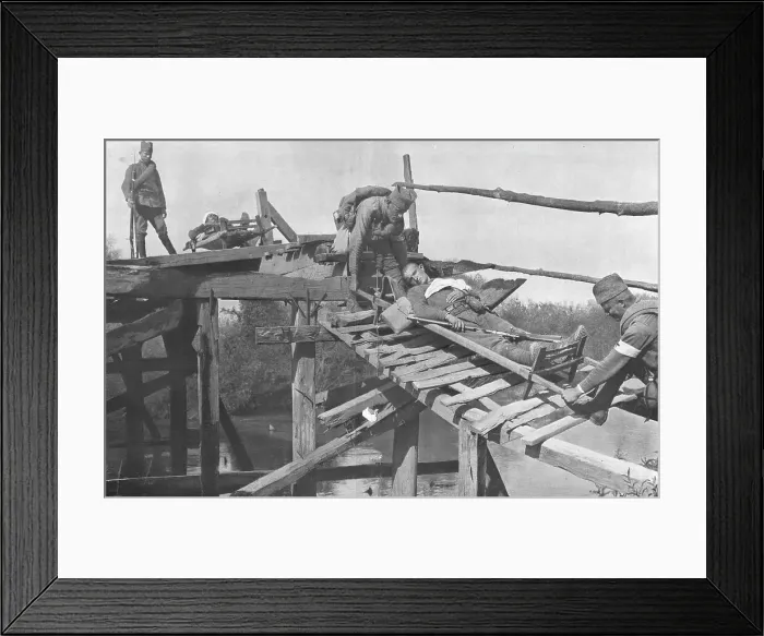 Framed Print : La Retraite Serbie; Evacuation des blesses sur la rive droite de la Morava, par un pont de... 1916 Creator: Vladimir Betzitch Framed Print : La Retraite Serbie; Evacuation des blesses sur la rive droite de la Morava, par un pont de... 1916 Creator: Vladimir Betzitch