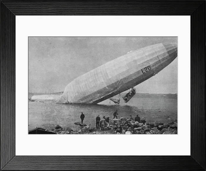 Framed Print : Trois Zeppelins detruits en trois jours. Le L20 dans un fjord de Norvege; En derivant... 1916. Creator: Unknown. Trois Zeppelins detruits en trois jours. Le L20 dans un fjord de Norvege; En derivant... 1916. Creator: Unknown Framed Print : Trois Zeppelins detruits en trois jours. Le L20 dans un fjord de Norvege; En derivant... 1916. Creator: Unknown. Trois Zeppelins detruits en trois jours. Le L20 dans un fjord de Norvege; En derivant... 1916. Creator: Unknown