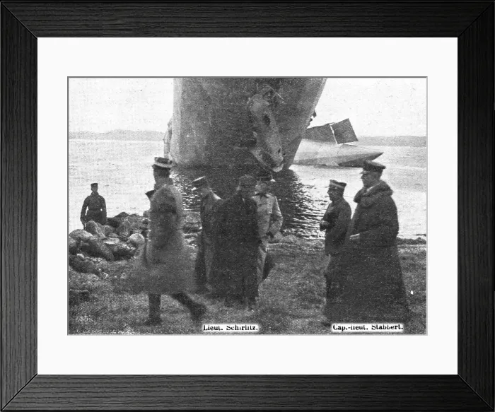 Framed Print : Trois Zeppelins detruits en trois jours. Le L20 dans un fjord de Norvege; Le capitaine... 1916. Creator: Unknown. Trois Zeppelins detruits en trois jours. Le L20 dans un fjord de Norvege; Le capitaine... 1916. Creator: Unknown Framed Print : Trois Zeppelins detruits en trois jours. Le L20 dans un fjord de Norvege; Le capitaine... 1916. Creator: Unknown. Trois Zeppelins detruits en trois jours. Le L20 dans un fjord de Norvege; Le capitaine... 1916. Creator: Unknown