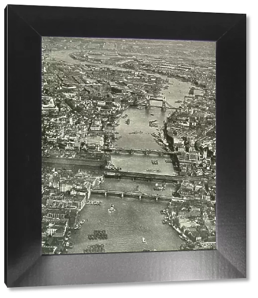 'The Great Street Paved With Water' The Thames from Southwark to Blackwall, 1937. Creator: Aerofilms. 'The Great Street Paved With Water' The Thames from Southwark to Blackwall, 1937. Creator: Aerofilms