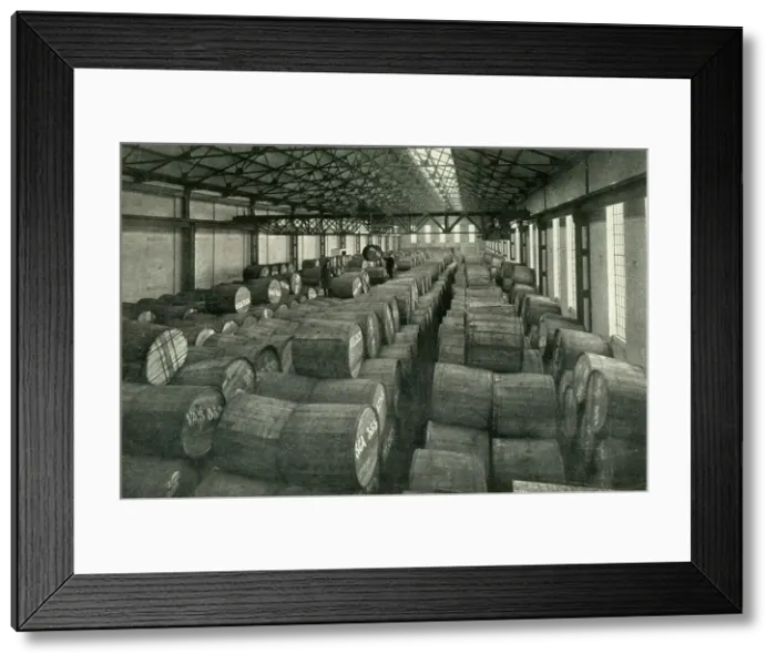 Framed Print : In the Warehouses of the P.L.A. with their Accommodation for a Million Tons -Tobacco... 1937. Creator: Unknown. In the Warehouses of the P.L.A. with their Accommodation for a Million Tons -Tobacco... 1937. Creator: Unknown Framed Print : In the Warehouses of the P.L.A. with their Accommodation for a Million Tons -Tobacco... 1937. Creator: Unknown. In the Warehouses of the P.L.A. with their Accommodation for a Million Tons -Tobacco... 1937. Creator: Unknown