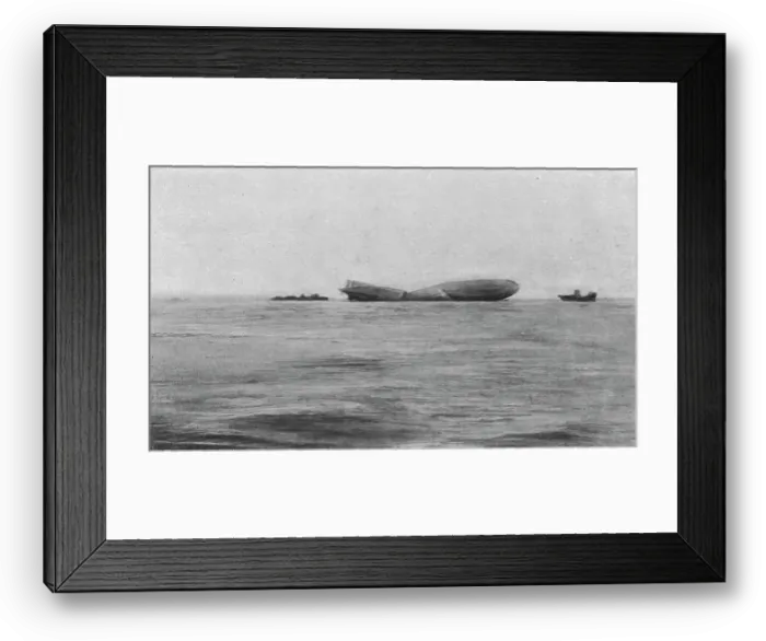 Framed Print : Le Zeppelin L-15 abattu dans l'estuaire de la Tamise; Le L-15 photographie au petit... 1916. Creator: Daily Sketch. Le Zeppelin L-15 abattu dans l'estuaire de la Tamise; Le L-15 photographie au petit... 1916 Framed Print : Le Zeppelin L-15 abattu dans l'estuaire de la Tamise; Le L-15 photographie au petit... 1916. Creator: Daily Sketch. Le Zeppelin L-15 abattu dans l'estuaire de la Tamise; Le L-15 photographie au petit... 1916