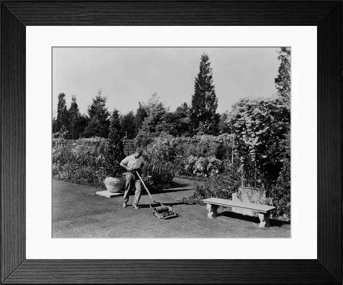 Framed Print : Gardener pushing lawn mower, posed to illustrate Rudyard Kipling's poem The Glory of the Garden, 1917 Creator: Frances Benjamin Johnston Framed Print : Gardener pushing lawn mower, posed to illustrate Rudyard Kipling's poem The Glory of the Garden, 1917 Creator: Frances Benjamin Johnston