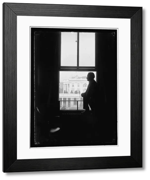 Framed Print : John Skelton Williams at window with White House visible in background... between 1913 and 1918. Creator: Harris & Ewing. John Skelton Williams at window with White House visible in background... between 1913 and 1918. Creator: Harris & Ewing Framed Print : John Skelton Williams at window with White House visible in background... between 1913 and 1918. Creator: Harris & Ewing. John Skelton Williams at window with White House visible in background... between 1913 and 1918. Creator: Harris & Ewing