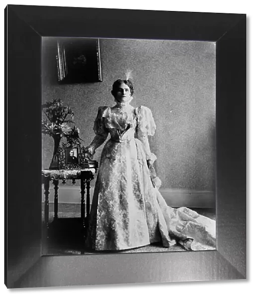 Ida S. McKinley, full-length portrait, standing, facing front, between 1890(?) and 1900(?). Creator: Frances Benjamin Johnston