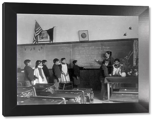 Elementary school class of Indian students with botanical specimens... Carlisle, Pennsylvania, 1901 Creator: Frances Benjamin Johnston