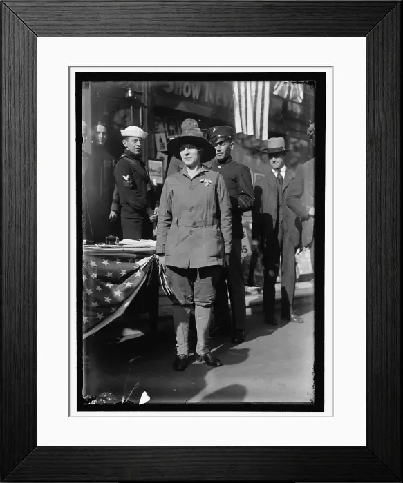 Framed Print : Dora Rodrigues, recruiter for service branches, possibly in front of the Cosmos Theater... May 1917 Creator: Harris & Ewing. Dora Rodrigues, recruiter for service branches, possibly in front of the Cosmos Theater Framed Print : Dora Rodrigues, recruiter for service branches, possibly in front of the Cosmos Theater... May 1917 Creator: Harris & Ewing. Dora Rodrigues, recruiter for service branches, possibly in front of the Cosmos Theater