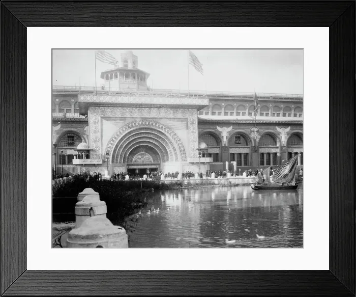 Framed Print : Transportation exhibit building with canal boat and ducks on canal(?) in foreground... 1893. Creator: Frances Benjamin Johnston Framed Print : Transportation exhibit building with canal boat and ducks on canal(?) in foreground... 1893. Creator: Frances Benjamin Johnston