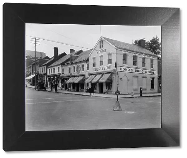 Brick Row, Commerce and Main Streets, located in the vicinity of Fredericksburg...Virginia, c1925. Creator: Frances Benjamin Johnston