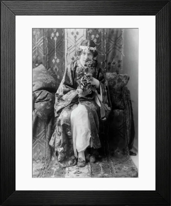 Framed Print : Neith Boyce Hapgood, full-length portrait, seated facing front, wearing... between 1890 and 1910. Creator: Frances Benjamin Johnston Framed Print : Neith Boyce Hapgood, full-length portrait, seated facing front, wearing... between 1890 and 1910. Creator: Frances Benjamin Johnston