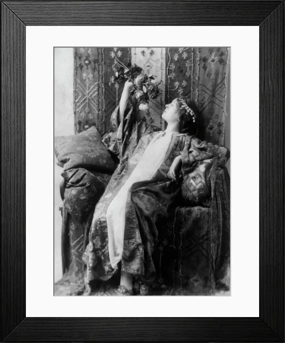 Framed Print : Neith Boyce Hapgood, full-length portrait, seated, left profile, wearing... between 1890 and 1910. Creator: Frances Benjamin Johnston Framed Print : Neith Boyce Hapgood, full-length portrait, seated, left profile, wearing... between 1890 and 1910. Creator: Frances Benjamin Johnston
