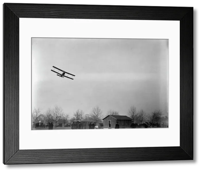 Framed Print : Allied Aircraft - Demonstration At Polo Grounds; Col. Charles E. Lee, British Aviator... 1917. Creator: Harris & Ewing. Allied Aircraft - Demonstration At Polo Grounds; Col. Charles E. Lee, British Aviator... 1917. Creator: Harris & Ewing